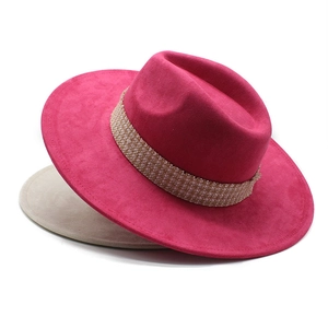 Fuchsia pink wide brim felt fedora hat with woven band detail and cream base layer
