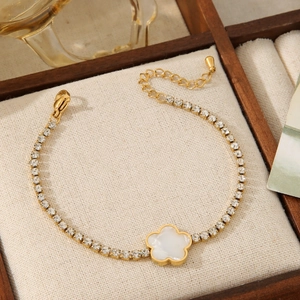 Elegant gold titanium steel flower bracelet with shell inlay and zircons for women