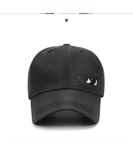Close-up of quick-dry black baseball cap featuring breathable vents and dot pattern