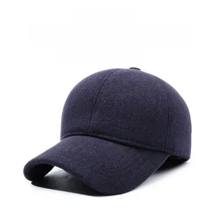Detail of warm baseball cap with ear flaps and thick navy blue wool blend fabric