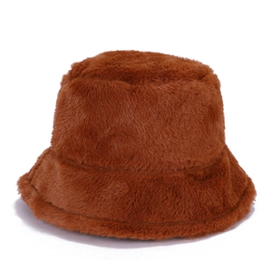Close-up of soft brown faux fur texture and warm plush material on fisherman hat
