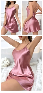 Detailed views of pink satin slip dress with crisscross back straps and silky fabric texture