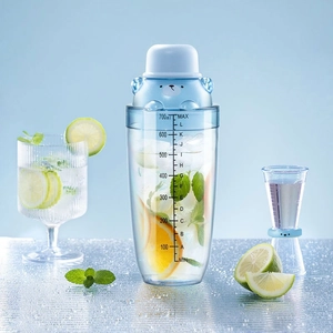 Blue 700ml bear-shaped cocktail shaker in plastic with clear measurement markings
