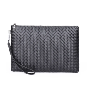 Classic black woven leather clutch bag for men with a detachable wrist strap and premium texture
