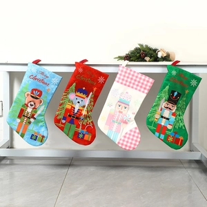 Set of four colorful Nutcracker Christmas stockings with Merry Christmas embroidery and loops