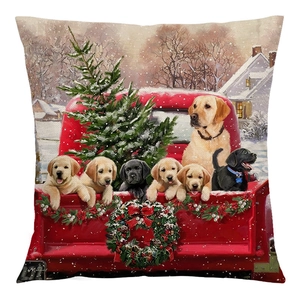 Vintage linen Christmas pillow cover featuring a red truck and labrador dogs in snow