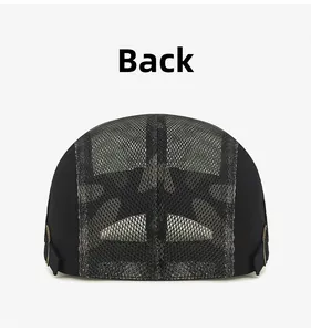 Detail view of the breathable mesh back and adjustable side buckles on the black newsboy cap