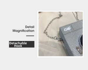 Detail view of the silver rhinestone camera bag showing the detachable metal chain hook