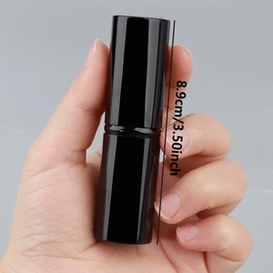 Portable flat head retractable foundation brush in black glossy case, 8.9cm length