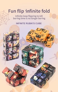 Detailed view of Halloween themed infinity cubes with various pumpkin and ghost patterns