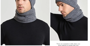 Detail of grey winter knit hat and neck warmer set showing thick ribbed texture for men