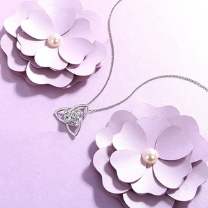 Elegant s925 silver necklace with heart-shaped Trinity Knot pendant and clear cubic zirconia