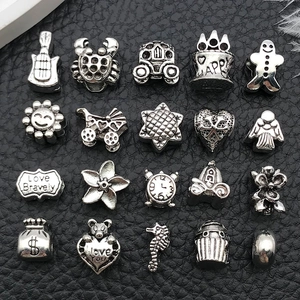 Collection of 20 Tibetan silver alloy charms featuring heart and crown DIY jewelry shapes