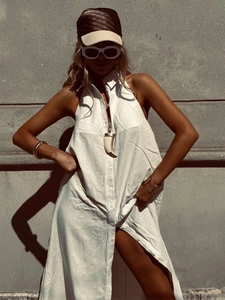 Elegant sleeveless white cotton maxi shirt dress with side slits and button closure