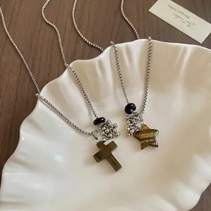 Vintage stainless steel beaded necklace set with tiger eye cross and star pendants