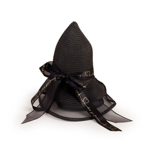 Detail of black straw hat featuring ribbon with love heart print and elegant bow design