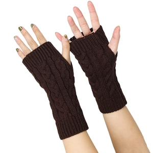 Detail of dark brown cable knit fingerless gloves showing arm warmer texture and pattern