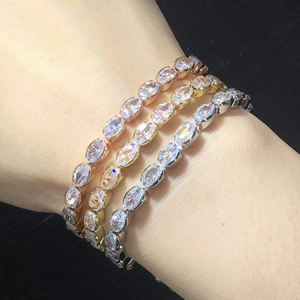 Adjustable tennis bracelets in gold, silver, and rose gold with sparkling oval zircons