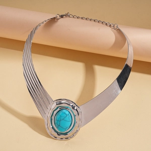 Close-up of silver-tone choker featuring a turquoise stone and lobster clasp closure