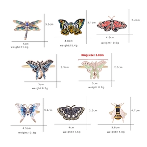 Detailed dimensions and weight of colorful insect-themed metal napkin rings set