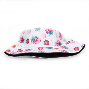 Detail of strawberry print bucket hat showing fabric texture and double-layer lining