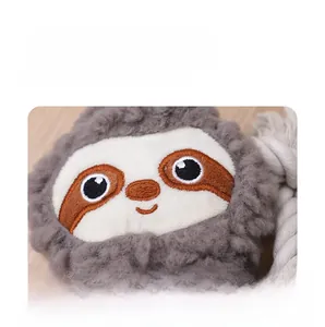 Detailed view of plush sloth dog toy with embroidered facial features and durable cotton rope
