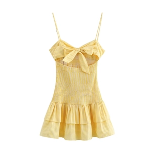 Yellow gingham mini dress with bow front, smocked waist and layered ruffle hemline