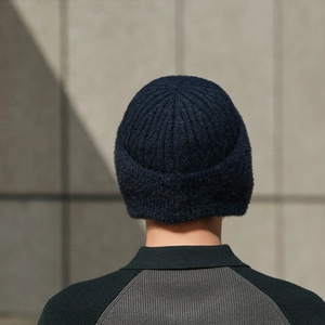Winter knitted beanie for men in navy blue with thermal fleece lining and ear protection