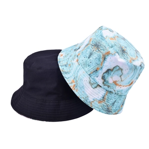 Set of two bucket hats including classic solid black and artistic blue marble print styles