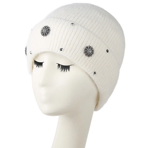 White ribbed knit beanie for women with sunburst floral metal accents and rhinestones