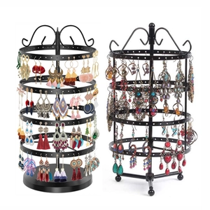Black rotating metal earring stand with tiered round display racks for jewelry storage