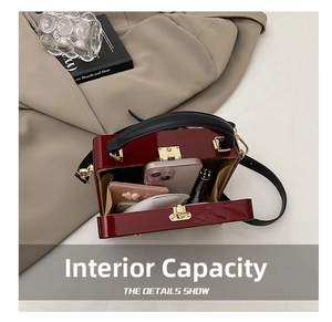 Detail view showing interior capacity of vintage radio style acrylic box handbag
