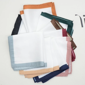 Men's minimalist white pocket squares set with various colored edge trim for wedding suits