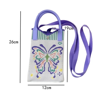 Detailed dimensions of white knitted phone bag with purple strap and pixel butterfly design