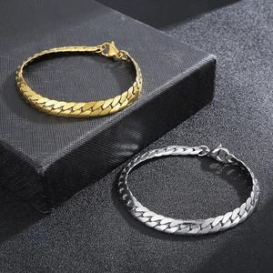 Flat Cuban link bracelet in gold and silver finish with lobster clasp closure