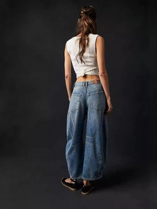 Jean denim femme bleu vintage à jambes larges avec taille haute et poche arrière