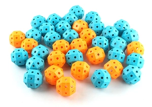 Close-up of blue and orange geometric connector spheres for DIY STEM tent building kits