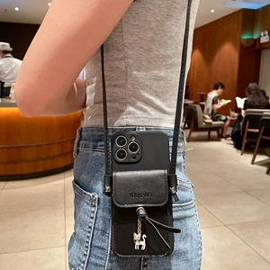Crossbody iPhone case with black leather card pouch and cute white cat charm detail