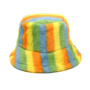 Close-up detail of plush rainbow striped bucket hat with colorful faux fur texture