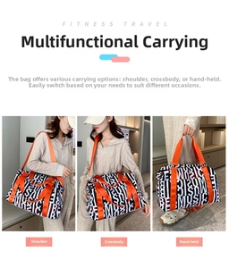 Detail showing high-capacity travel bag with orange straps and black letter print fabric