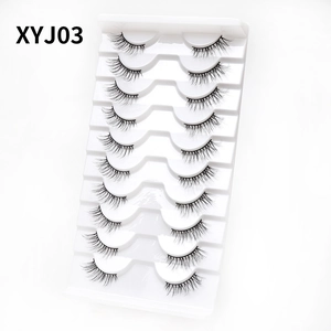 Macro shot of 10 pairs of XYJ03 black synthetic cat-eye false eyelashes for a natural lift