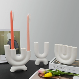 Modern minimalist white ceramic U-shaped candle holder for elegant home dining table decor