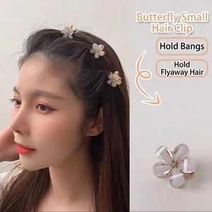 Elegant camellia flower hair clip with rhinestones and pearlescent finish for women