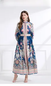 Detail of vintage navy maxi dress with stand collar, floral prints and lantern sleeves