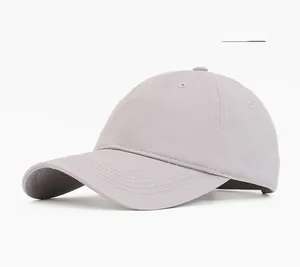 Detail view of a light gray cotton baseball cap with structured stitching and ventilation eyelets