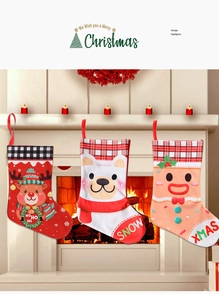 Detailed trio of Christmas stockings with reindeer, bear and gingerbread man designs