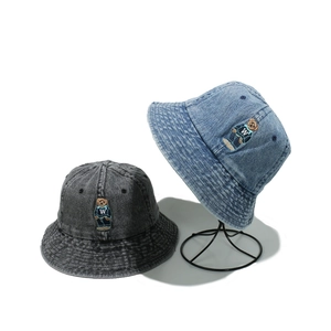 Retro washed denim bucket hats for men and women with bear embroidery detail