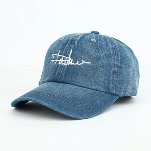 Blue denim baseball cap with white cursive embroidery and adjustable curved brim style