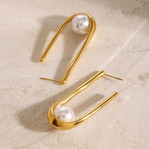 Elegant 18k gold plated stainless steel U-shaped earrings with large white pearls