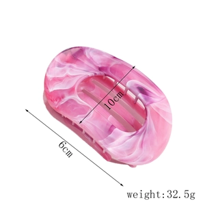 Pink leopard hair claw clip showing 10cm length and 32.5g weight measurements